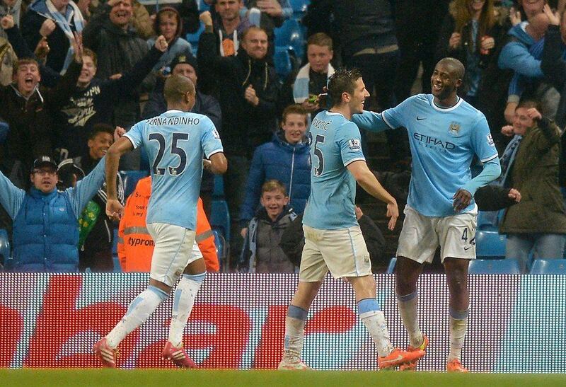 Manchester City lead the Premier League by two points over Liverpool. Paul Ellis / AFP  