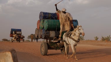 Goods move across the border between Sudan and Chad, where hundreds of thousands of Sudanese from the Darfur region have taken refuge from the war in their country. Getty Images