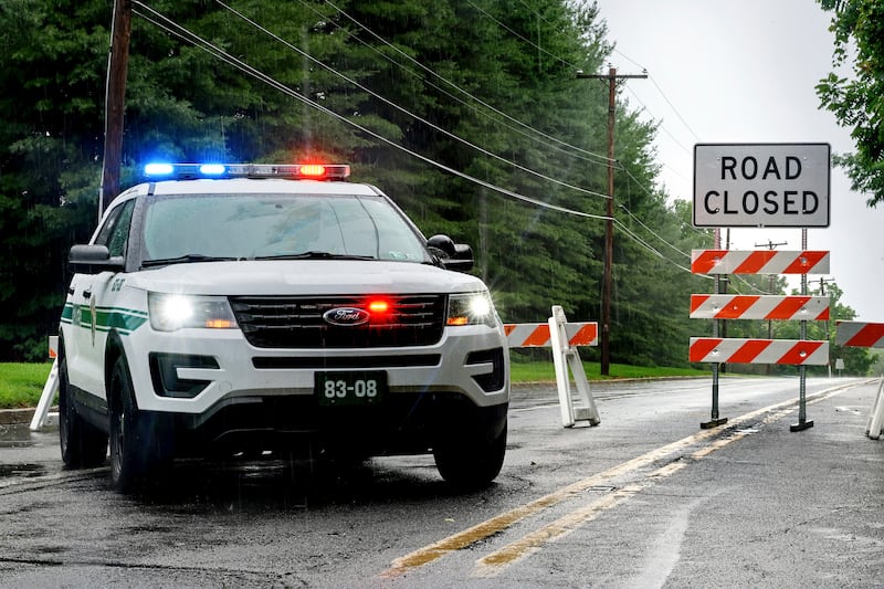 A road is closed after fatal flash flooding in the US state of Pennsylvania. The Philadelphia Inquirer / AP
