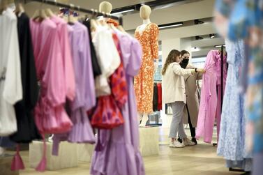 People shop in the Selfridges department store on Oxford street. Clothing prices rose 2.3 per cent, the biggest jump since 2018, as retailers scaled back discounting. Reuters