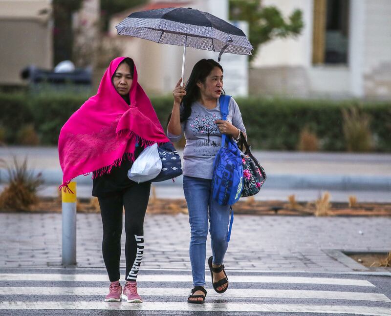 The National Centre of Meteorology issued a yellow alert for much of Abu Dhabi and Dubai, forecasting rain and low visibility until 8.30pm on Thursday. Victor Besa / The National