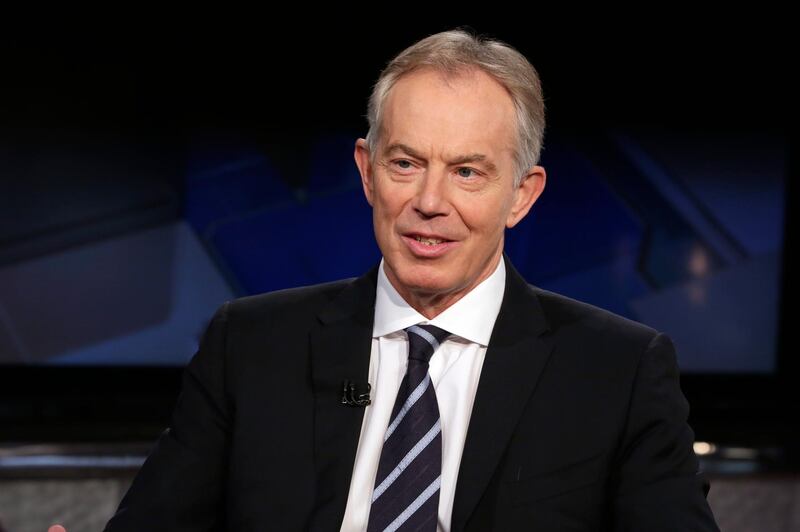 FILE- In this Wednesday, Feb. 24, 2016 file photo, former British Prime Minister Tony Blair is interviewed by Maria Bartiromo during her "Mornings with Maria" program on the Fox Business Network, in New York. Blair said in an article published Saturday, July 15, 2017, thereâ€™s a chance Britain won't leave the European Union, and stopping Brexit is "necessary" to avoid severe economic damage.  (AP Photo/Richard Drew, File)