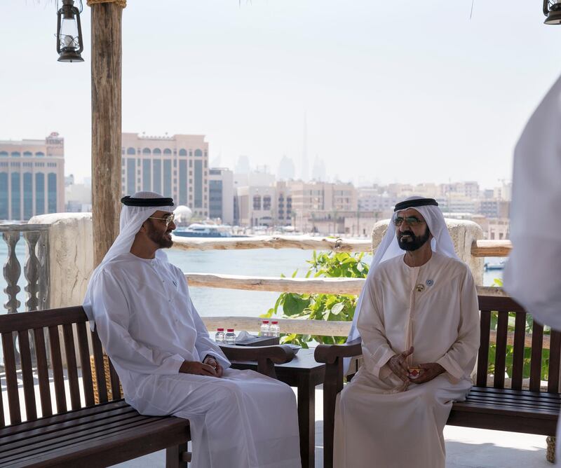 DUBAI, UNITED ARAB EMIRATES - March 20, 2018: HH Sheikh Mohamed bin Zayed Al Nahyan Crown Prince of Abu Dhabi Deputy Supreme Commander of the UAE Armed Forces (L), speaks with HH Sheikh Mohamed bin Rashid Al Maktoum, Vice-President, Prime Minister of the  UAE, Ruler of Dubai and Minister of Defence (R), prior to the signing of a joint venture agreement between Aldar and Emaar, in Shindagha Heritage District. 

( Mohamed Al Hammadi / Crown Prince Court - Abu Dhabi )
---
