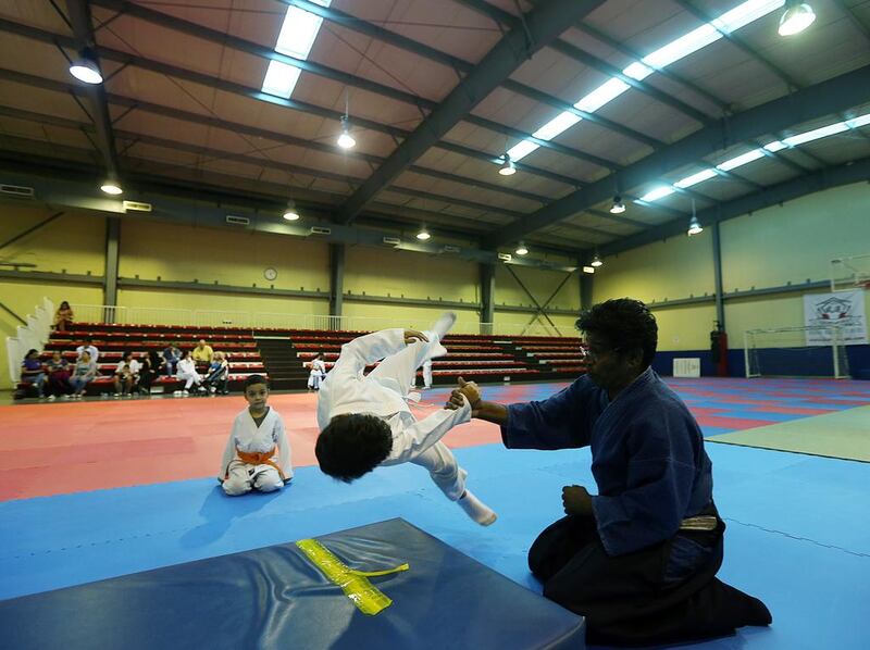 Teacher John Sugumar Ratnam with beginners at an Aikido class in Dubai. Satish Kumar / The National    