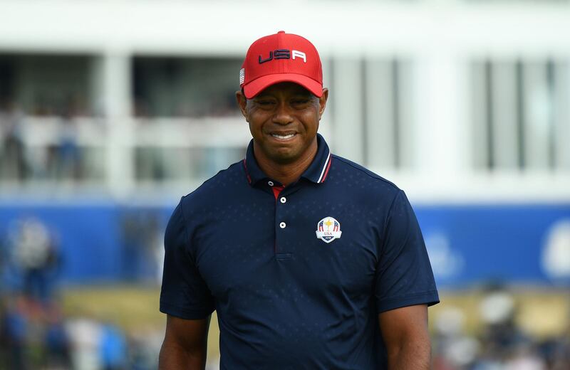 Tiger Woods of USA reacts during his singles match. AFP