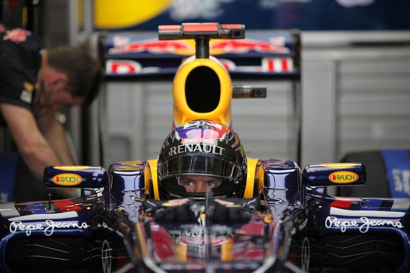 
ABU DHABI , UNITED ARAB EMIRATES  Ð  Nov 11 : Sebastian Vettel of Red Bull Racing team sitting in his F1 car before the start of Formula 1 first practice session at the Yas Marina Circuit in Abu Dhabi. ( Pawan Singh / The National ) For Sports. Story by Graham and Gary