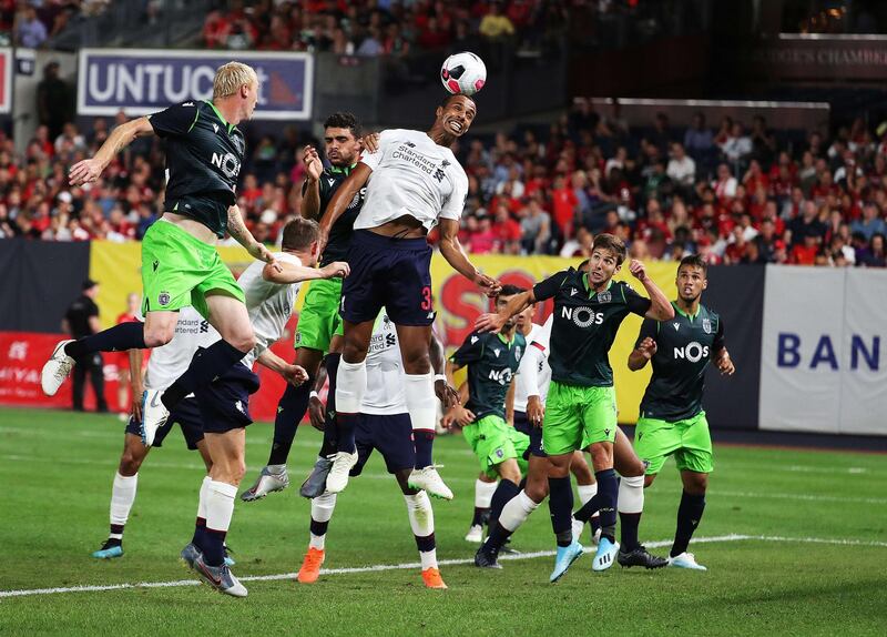 Liverpool's Joel Matip heads the ball. AFP