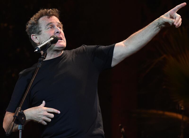 (FILES) In this file photo taken on June 16, 2014 South African singer Johnny Clegg performs during the 20th edition of the World Sacred Music Festival in Fez, Morocco. South African singer Johhny Clegg has died at the age of 66, his manager said, on July 16, 2019. / AFP / Fadel SENNA
