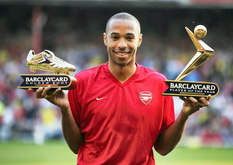 LONDON - MAY 17:  Thierry Henry of Arsenal shows off his Golden Boot and Barclaycard Premiership Player of the Year Award during the Martin Keown Testimonial match between Arsenal and England XI at Highbury, on May 17, 2004 in London.  (Photo by Clive Mason/Getty Images)