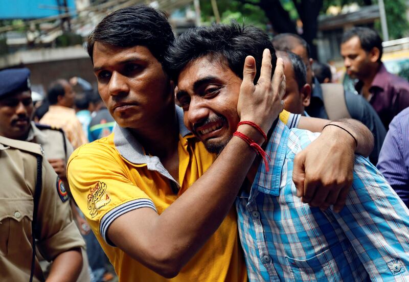 A relative of a stampede victim grieves at a hospital in Mumbai, India. Danish Siddiqui / Reuters