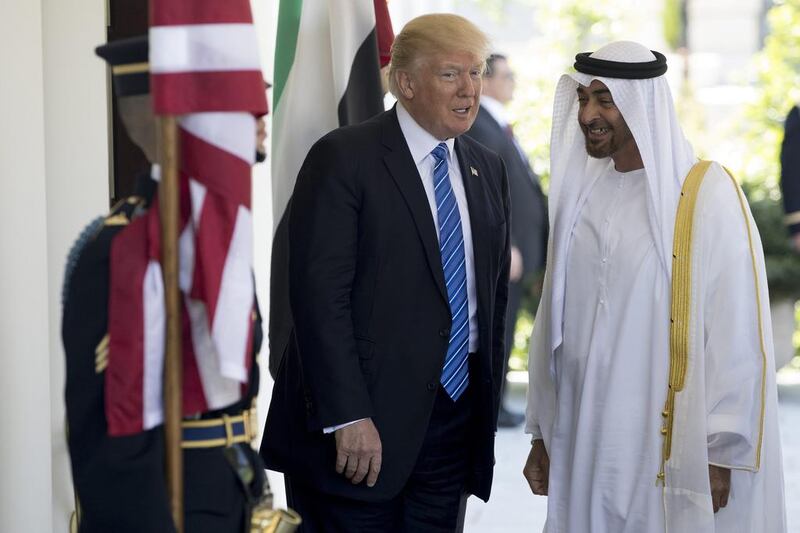 US president Donald Trump greets Sheikh Mohamed bin Zayed, Crown Prince of Abu Dhabi and Deputy Supreme Commander of the Armed Forces, at the White House in Washington, DC, in May 2017. Aaron Bernstein / Bloomberg News