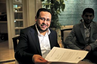 Abdul Hakim Belhaj with the letter of apology from the British government in Istanbul in 2018. AP