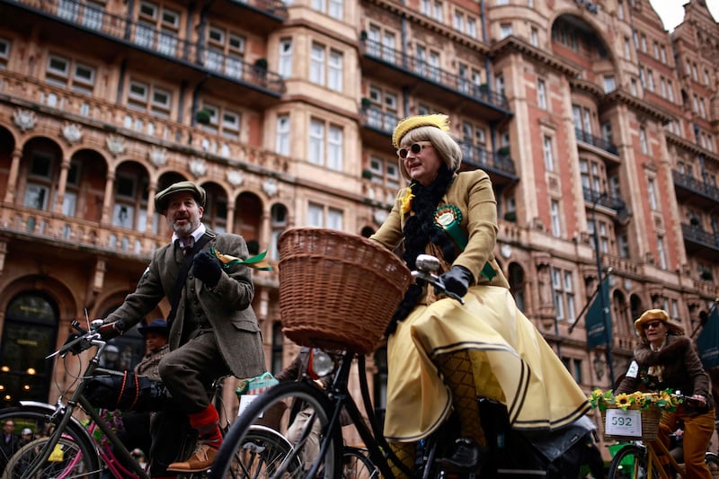 Cyclists wear vintage clothing to take part in The Tweed Run cycle ride. AFP