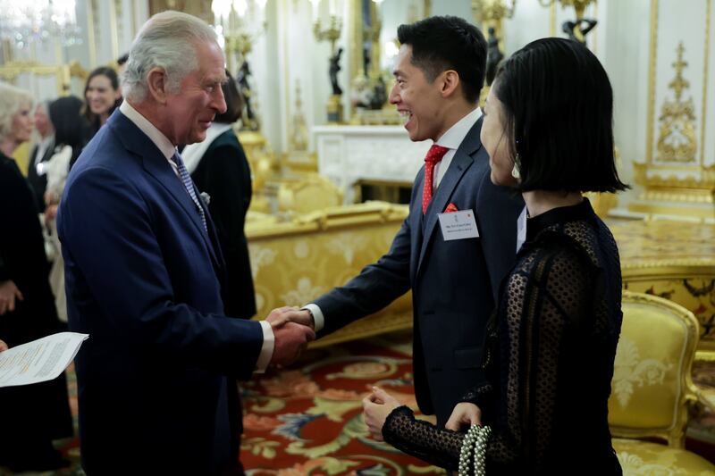 King Charles hosts members of Britain's East and South-East Asian communities. PA