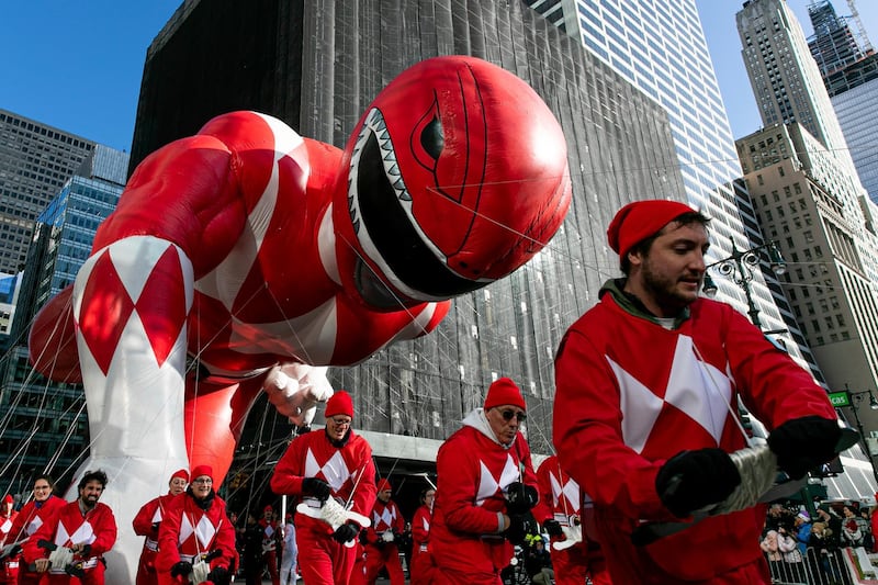Power Rangers Go - the Mighty Morphin Red Ranger balloon makes its way down New York's Sixth Avenue . AP
