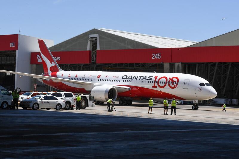 Qantas flight QF7879 arrives at the hangar. EPA