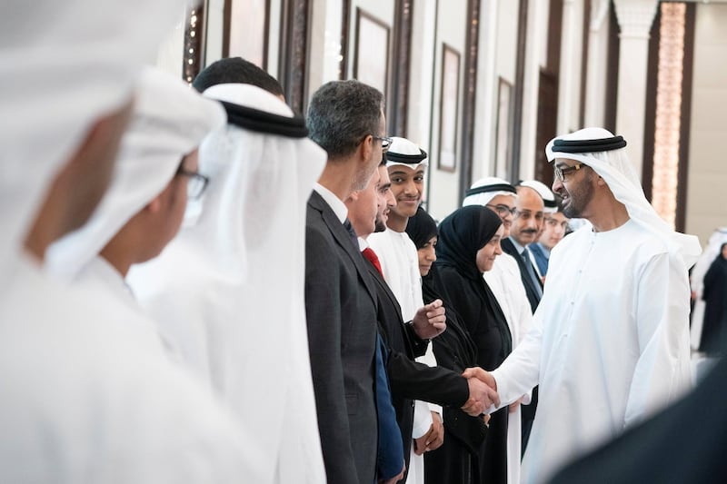 ABU DHABI, UNITED ARAB EMIRATES - July 17, 2019: HH Sheikh Mohamed bin Zayed Al Nahyan, Crown Prince of Abu Dhabi and Deputy Supreme Commander of the UAE Armed Forces (R) receives the honors and outstanding students of Grade 12 and their parents, at Al Bateen Palace.

( Mohamed Al Hammadi / Ministry of Presidential Affairs )
---