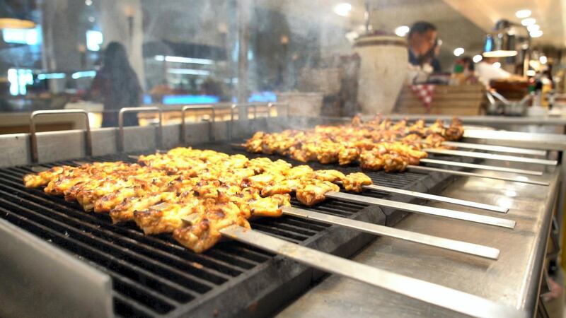Kebabs being prepared at Turquoise restaurant at Rixos Saadiyat Island. 