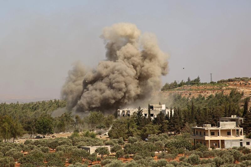 Smoke billows following a reported Russian airstrike on the western outskirts of the mostly rebel-held Syrian province of Idlib, on September 20, 2020. / AFP / Mohammed AL-RIFAI

