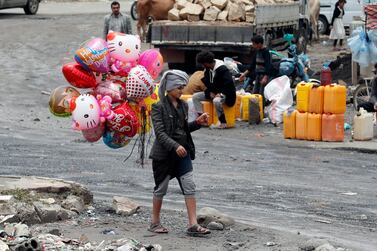 A Yemeni vendor displays colourful balloons for sale ahead of Eid Al Adha in Sanaa. EPA