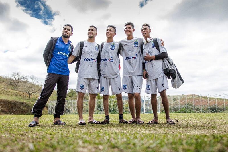 From left: Jawdat (the coach), Ahmad, Omar, Qais, Hafeth (nicknamed 'Marcelo') on the pitch in Brazil. Courtesy The Black Pearls Academy