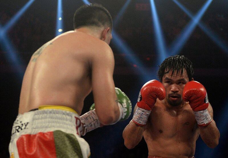 With the win, Pacquiao became the WBO world welterweight title holder. He has been a world champion in six different weight classes. Dale de la Rey / AFP