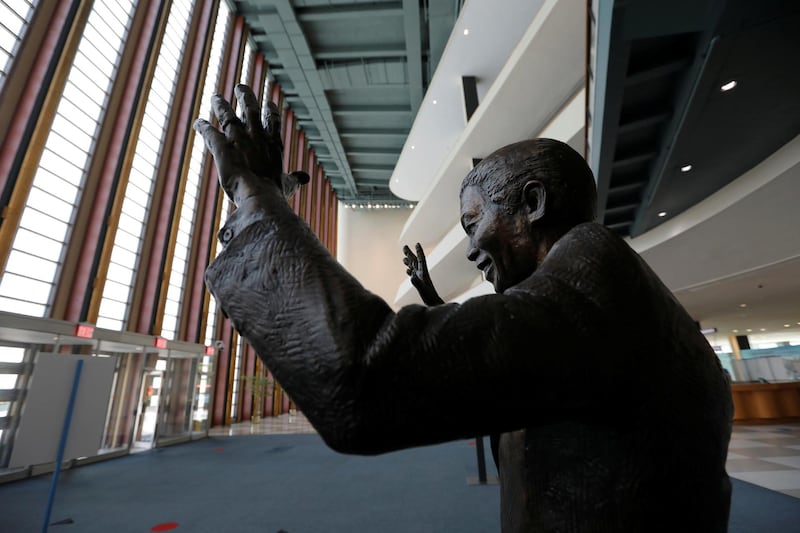 A statue of former South African President Nelson Mandela is seen in the empty arrivals hall at United Nations headquarters during the 75th annual UN General Assembly high level debate. Reuters
