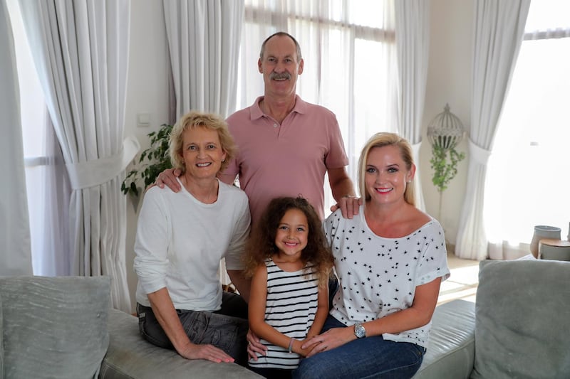 Dubai, United Arab Emirates - March 10th, 2018: Benita Bohsali (R) with her family, mum and dad Gary and Anita Hiles and daughter Isla 5. Benita's husband very sadly died in a car accident when their daughter was just two months old. He was the main earner, so without him she struggled with money. So she decided to set up a business for an extra income on the side (she also works full time for a beverage company). The week in the life will concentrate on these business, which she runs with the help of her parents. Saturday, March 10th, 2018 at Motor City, Dubai. Chris Whiteoak / The National