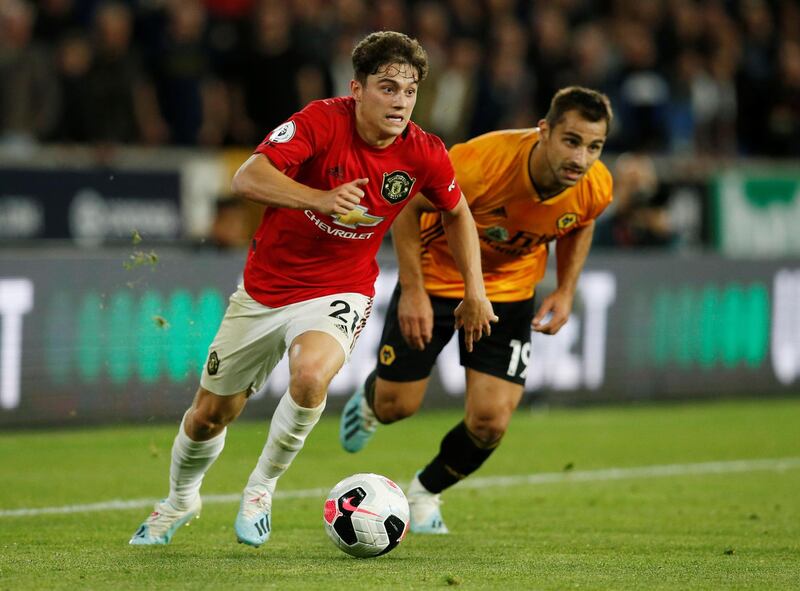 Manchester United's Daniel James in action with Wolverhampton Wanderers' Jonny. Reuters