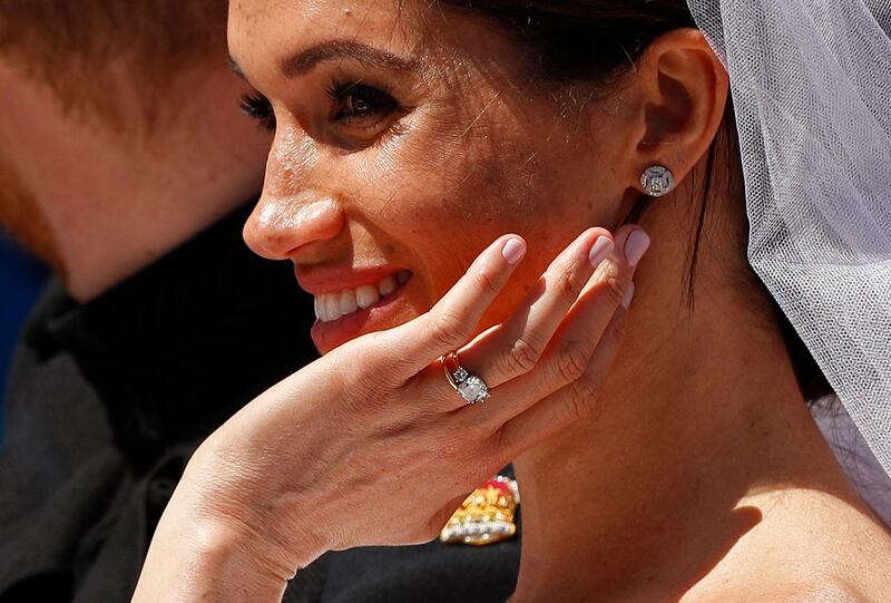 WINDSOR, ENGLAND - MAY 19:  Prince Harry, Duke of Sussex and The Duchess of Sussex leave Windsor Castle in the Ascot Landau carriage during a procession after getting married at St Georges Chapel on May 19, 2018 in Windsor, England.  (Photo by John Sibley - WPA/Getty Images)