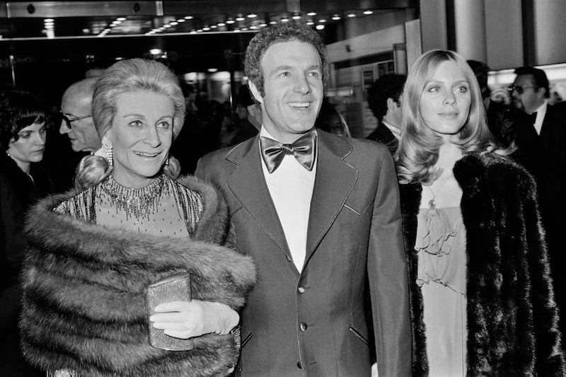 Caan poses with his wife US actress Sheila Caan and French-US actress Lilyan Chauvin during the preview of the film 'Funny Lady' in Paris, France.  AFP