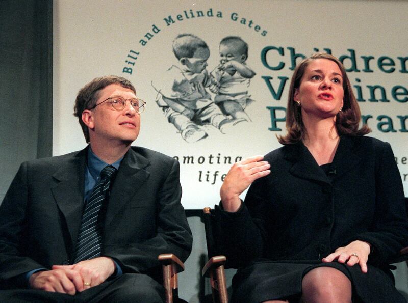 (FILES) Microsoft Chairman Bill Gates (L) and his wife Melinda (R) hold a press conference in New York 02 December to announce a 100 million USD gift to establish the Bill and Melinda Gates Children's Vaccine Program. Time magazine said 18 December, 2005 it had selected rock star-turned-activist Bono and philanthropists Bill and Melinda Gates as its 2005 "Persons of the Year."   AFP PHOTO/FILES/Timothy A. CLARY (Photo by TIMOTHY A. CLARY / AFP)