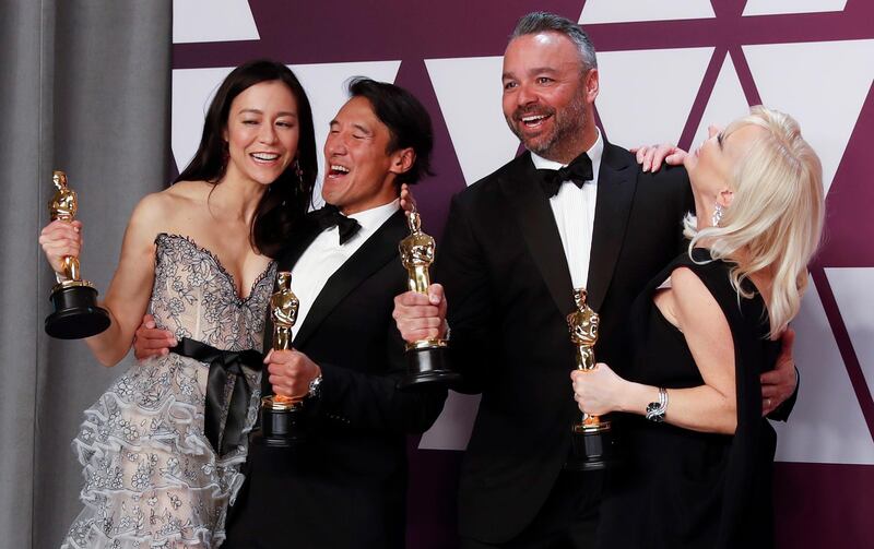 Free Solo's Elizabeth Chai Vasarhelyi, Jimmy Chin, Evan Hayes and Shannon Dill celebrate their Best Documentary Feature  win. EPA