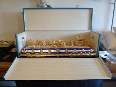 A scale model of the gold state coach, given as a gift to Queen Elizabeth II by Sultan Qaboos bin Said for the queen's diamond jubilee in 2012. Photo: Hermitage Bespoke