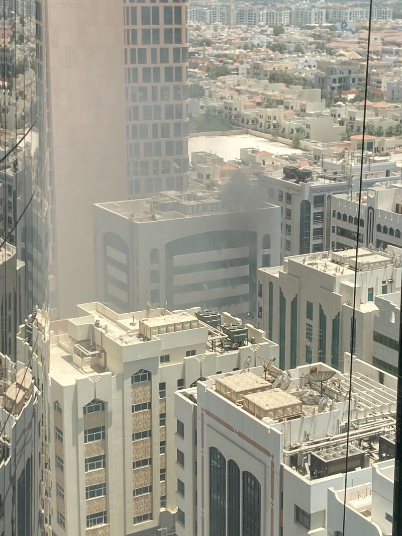 Smoke rises from the roof of a building in Khalidiya. Police said a gas cylinder had exploded. The National