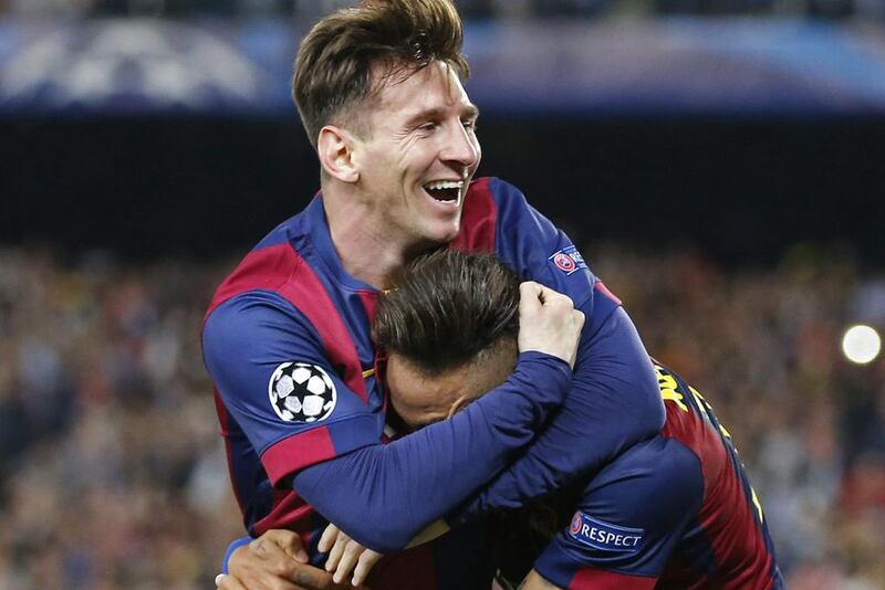 Lionel Messi and Neymar of Barcelona celebrate on Wednesday during their side's 3-0 win against Bayern Munich in the Champions League semi-final first leg at the Camp Nou. Gustau Nacarino / Reuters