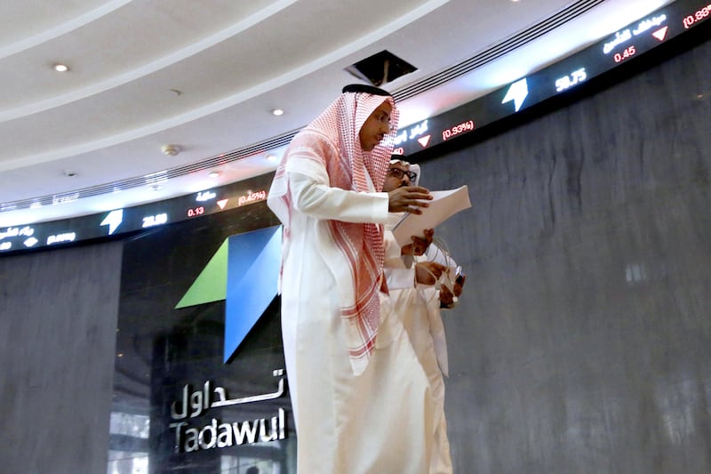 Investors are seen at the Tadawul stock exchange in Saudi Arabia. AP