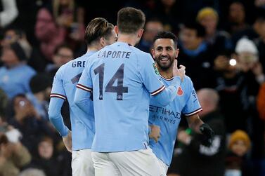 Soccer Football - Carabao Cup Third Round - Manchester City v Chelsea - Etihad Stadium, Manchester, Britain - November 9, 2022 Manchester City's Riyad Mahrez celebrates scoring their first goal with Jack Grealish and Aymeric Laporte REUTERS/Craig Brough EDITORIAL USE ONLY.  No use with unauthorized audio, video, data, fixture lists, club/league logos or 'live' services.  Online in-match use limited to 75 images, no video emulation.  No use in betting, games or single club /league/player publications.   Please contact your account representative for further details. 