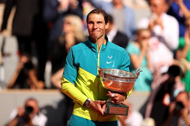 Nadal celebrates with the French Open trophy. Getty