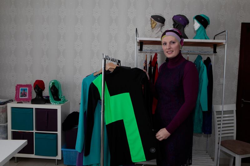 Dubai, United Arab Emirates - April 3, 2013.  Sarah Sillis ( Fashion Designer ) with her Muslim inspired outfit and sportswear, at her shop.  ( Jeffrey E Biteng / The National )