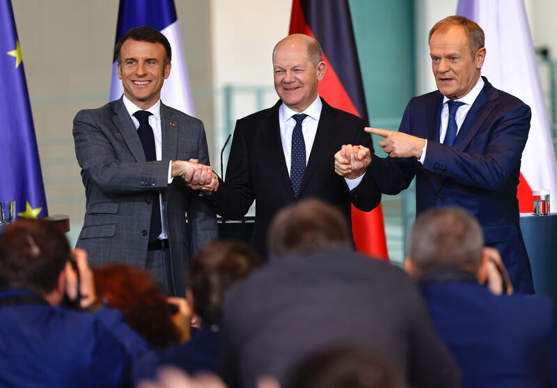 From left, French President Emmanuel Macron, German Chancellor Olaf Scholz and Poland's Prime Minister Donald Tusk put on a show of unity in Berlin. EPA