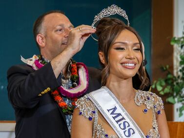 Hawaii Governor Josh Green crowns Savannah Gankiewicz as Miss USA 2023 in Honolulu. AP