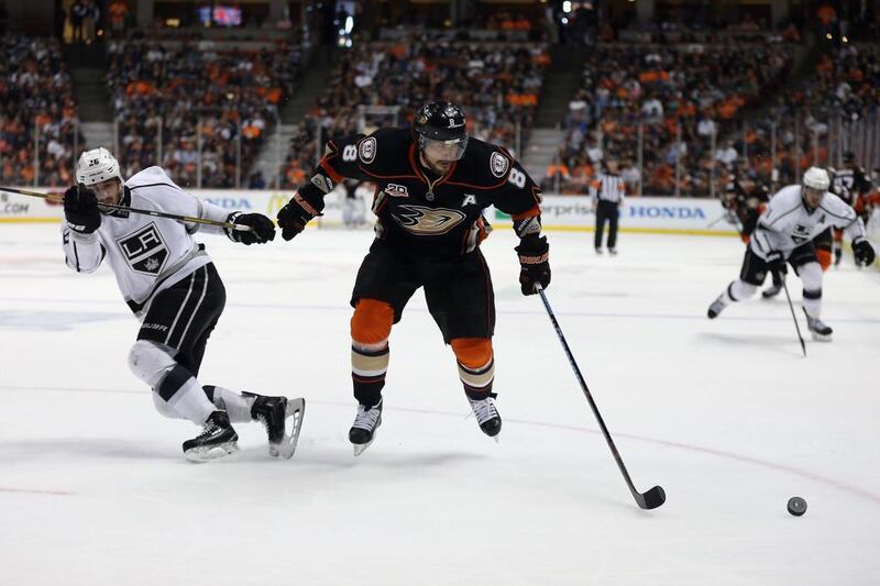 Teemu Selanne, centre, of the Anaheim Ducks skates away from Slava Voynov of the Los Angeles Kings in the first period of Game 7 of their NHL play-off series on May 16, 2014 in Anaheim, California. The Kings defeated the Ducks 6-2. Jeff Gross/Getty Images