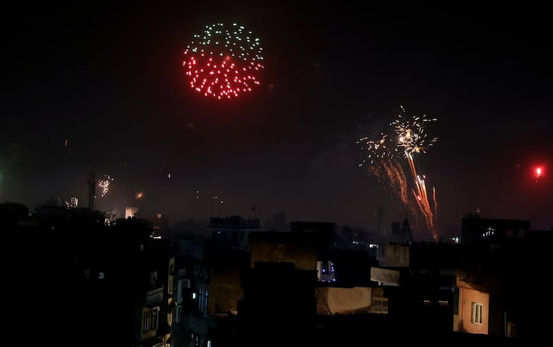 People in India light fireworks on the occasion of the Diwali festival.  EPA