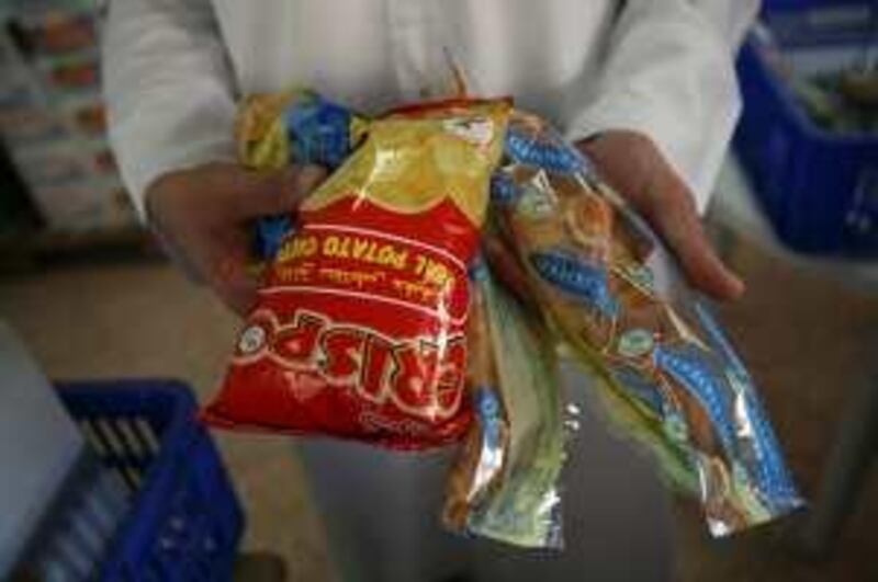 Dubai, UAE - December 23, 2009 - Potato chips, croissants, juice and candy bars are offered for snack at Al Safa Secondary School. (Nicole Hill / The National) *** Local Caption ***  NH JunkFood19.jpg