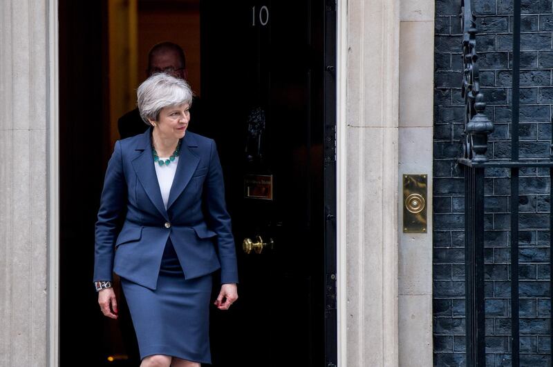 Theresa May, U.K. prime minister, leaves to greet Mark Rutte, Netherland's prime minister, outside number 10 Downing Street in London, U.K., on Wednesday, Feb. 21, 2018. U.K. Prime Minister Theresa May is asking the European Union for flexibility on the length of the Brexit transition period with just over a year before the country leaves the bloc. Photographer: Chris J. Ratcliffe/Bloomberg