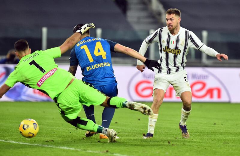 Juventus' Aaron Ramsey scores their third goal which is later disallowed. Reuters