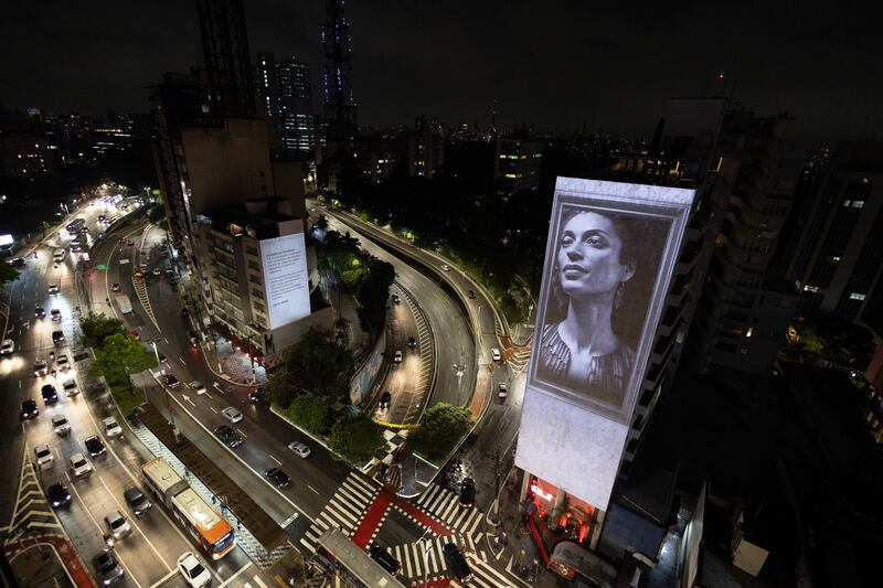 Five years after her death, an image of councillor Marielle Franco is projected in central Sao Paulo, Brazil. EPA