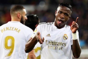 epa08263292 Real Madrid's Vinicius Junior (R) celebrates after scoring the 1-0 lead during the Spanish La Liga soccer match between Real Madrid and FC Barcelona, traditionally known as 'El Clasico', at Santiago Bernabeu stadium in Madrid, Spain, 01 March 2020. EPA/JUANJO MARTIN
