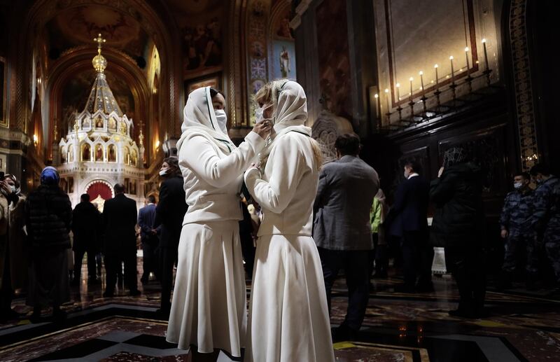 Russian Orthodox devotees attend a service on Orthodox Christmas at the Christ the Savior Cathedral in Moscow, Russia. EPA